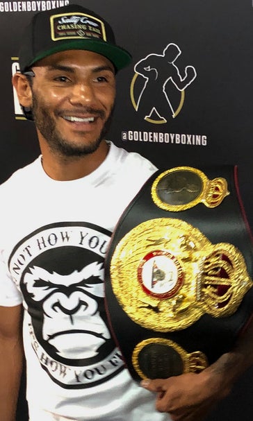 Champion boxer balances training with day job at gas company
